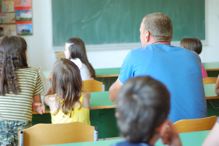 children with their parents at school