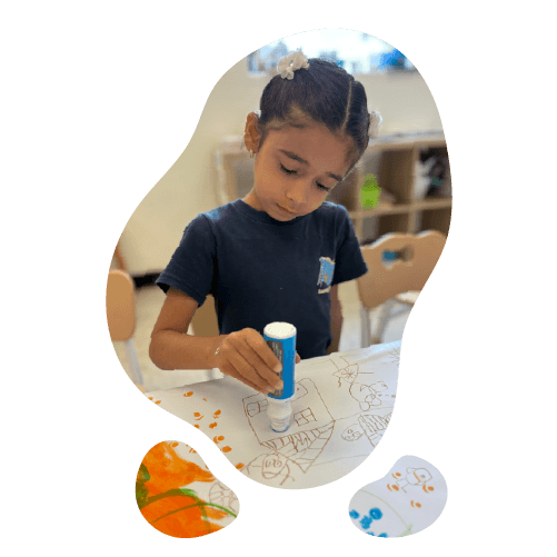 Child doing arts and crafts activity at Summer Camp Learning Village in Pembroke Pines Florida