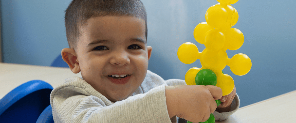 Children learning through hands-on activities at Learning Village Preschool